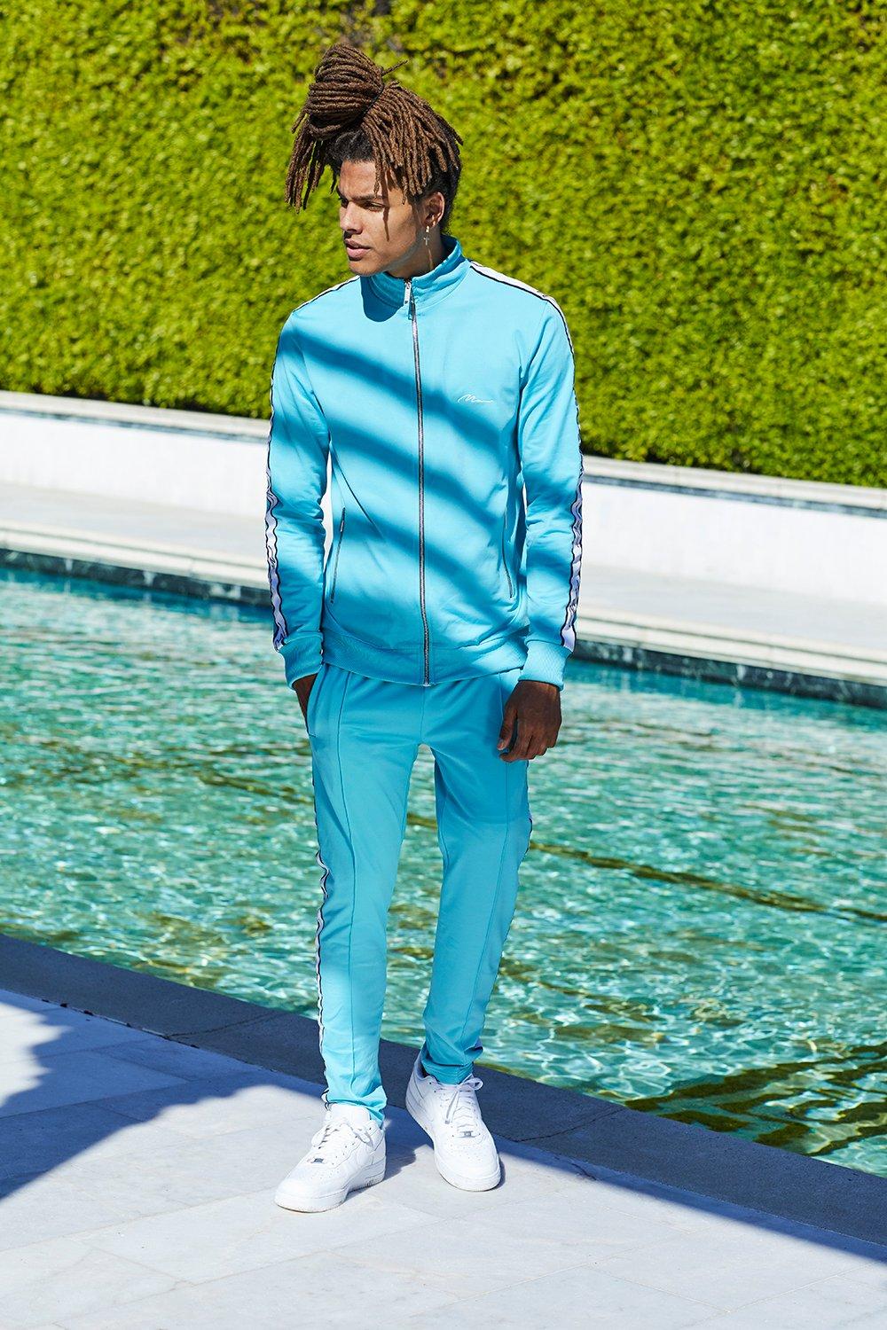 turquoise tracksuit