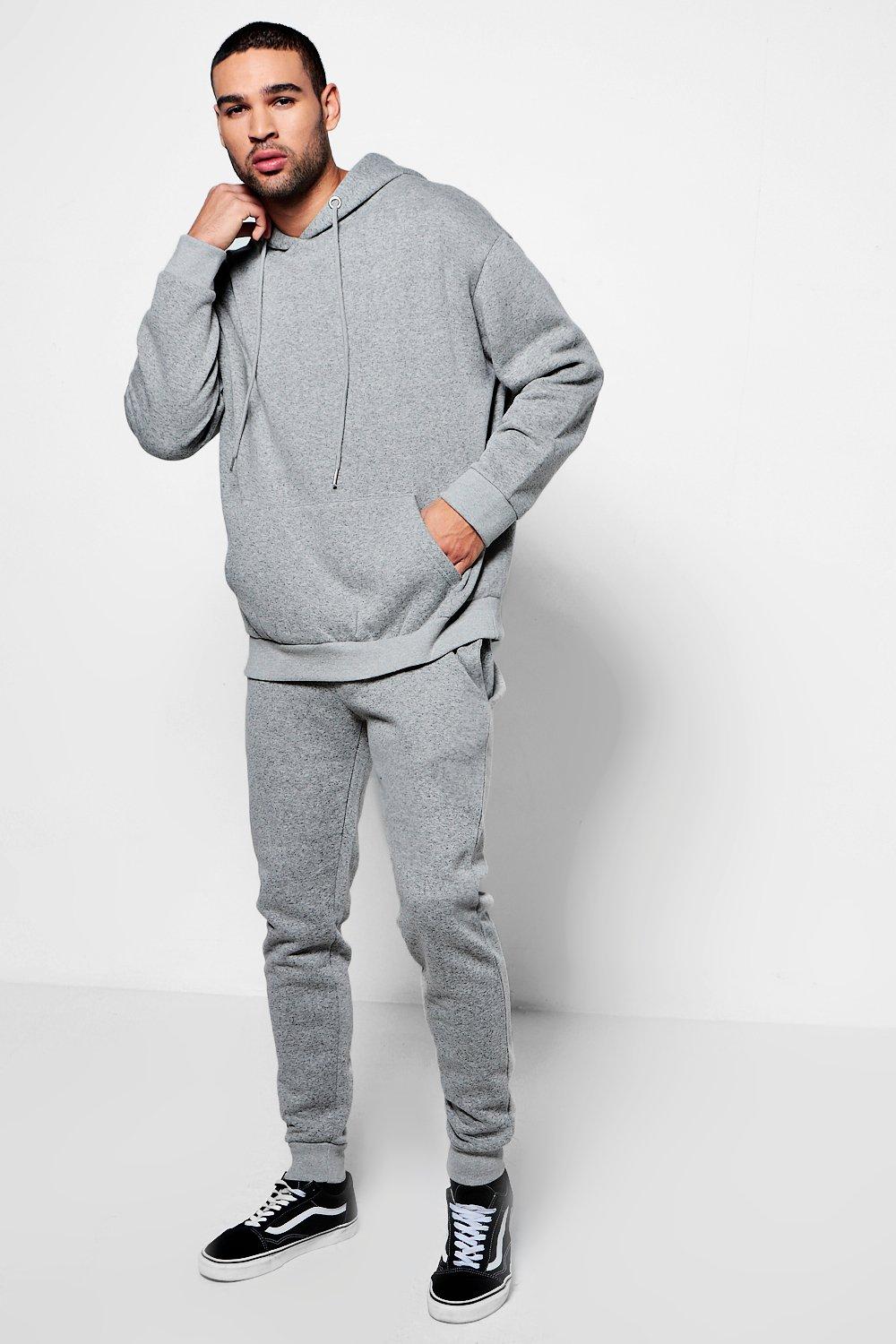 grey joggers and hoodie