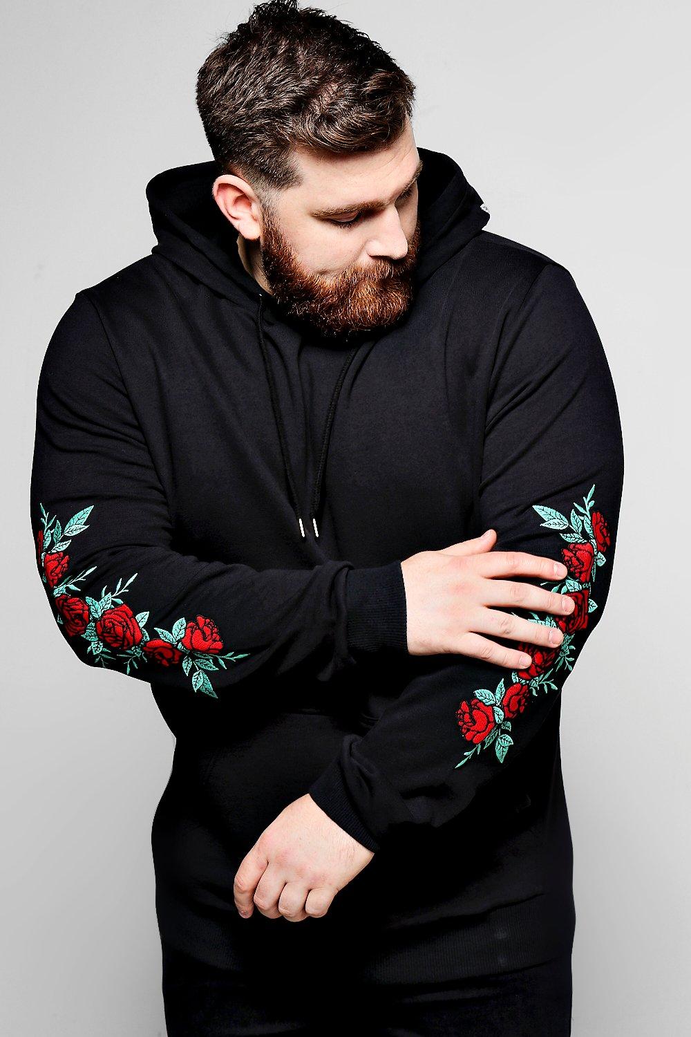 Black hoodie with store roses on sleeves