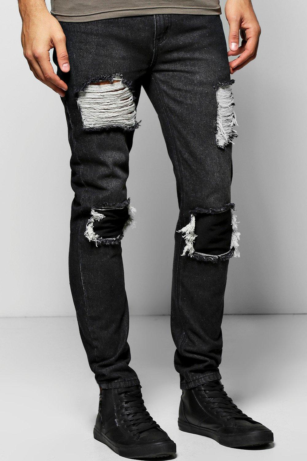 black ripped and repaired jeans